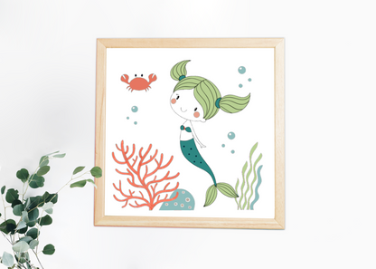 Cadre décoratif évoquant le monde marin avec une sirène dessinée dans un style cartoon