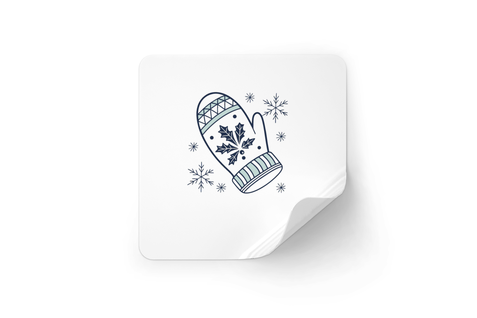 Sticker festif affichant une moufle nordique enneigée sur fond hivernal