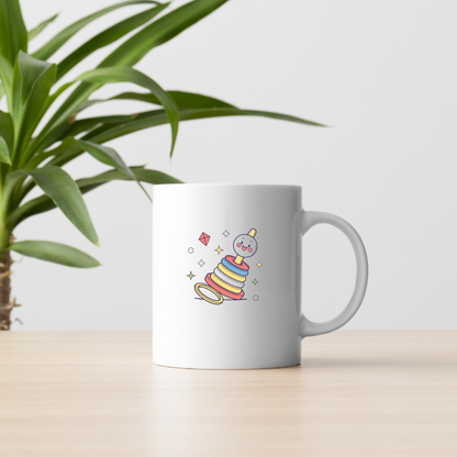 Motif kawaii sur mug avec design de jouet à anneaux vintage