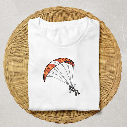 T-shirt graphique avec motif parapentiste en vol dans un style aérien dynamique