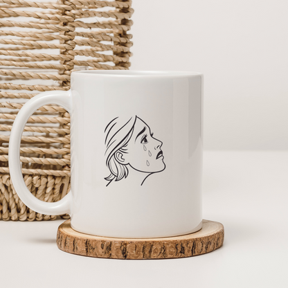 Mug avec icône minimaliste détaillant un visage émotionnellement expressif