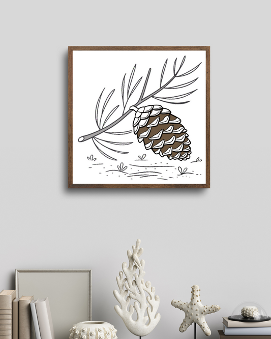 Cadre avec pomme de pin minimaliste en équilibre pour une touche naturelle