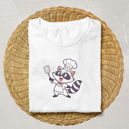 Un t-shirt amusant décoré d'un joyeux raton-laveur cuisinier en style kawaii