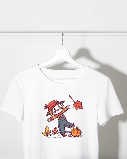 T-shirt avec épouvantail gai sur fond automnal, style kawaii attrayant