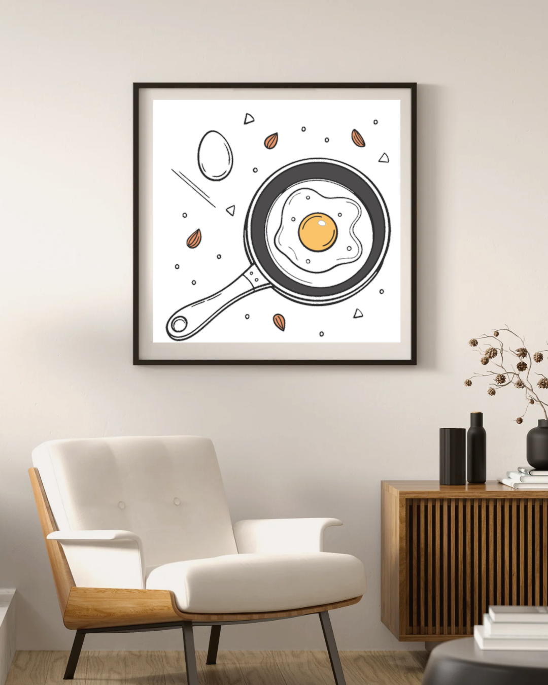 Cadre au design minimaliste avec un œuf au plat stylisé en noir et blanc