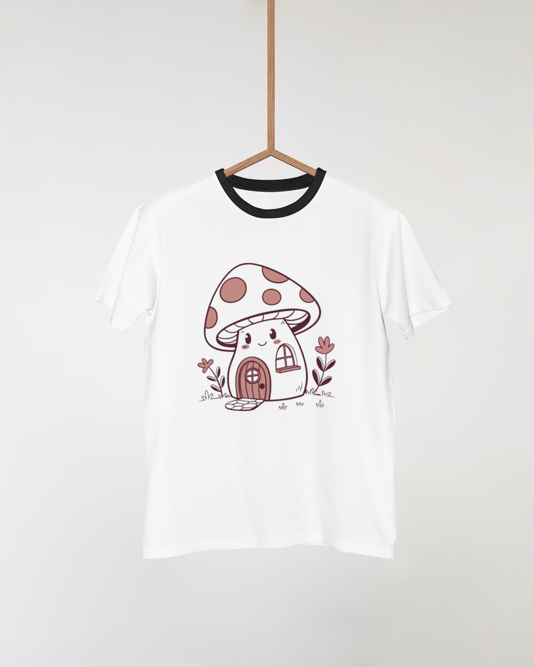 T-shirt orné d'un doodle de maison champignon souriante dans un style fantastique