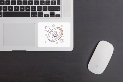 Sticker au style kawaii avec un donut flottant heureux sur fond de ciel étoilé