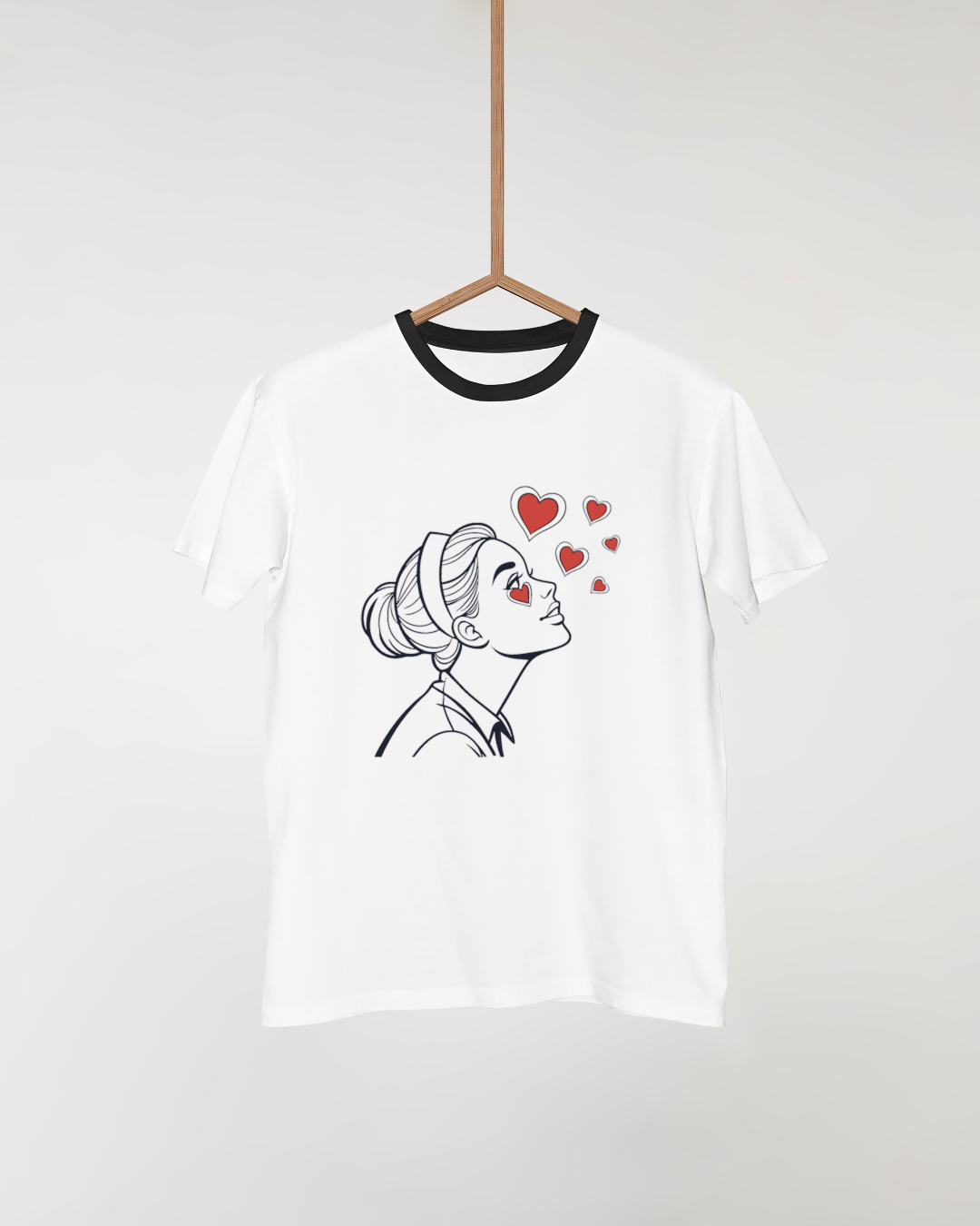 T-shirt avec icône minimaliste jeune femme et cœurs flottants ambiance artistique