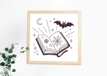 Cadre au style mystique avec livre et chauve-souris pour une touche halloween