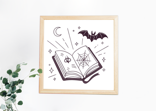 Cadre au style mystique avec livre et chauve-souris pour une touche halloween