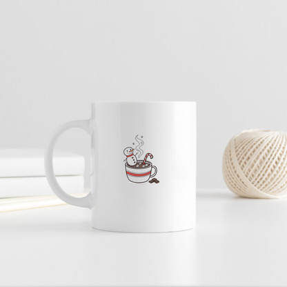 Mug festif avec un bonhomme de neige flottant dans du chocolat chaud