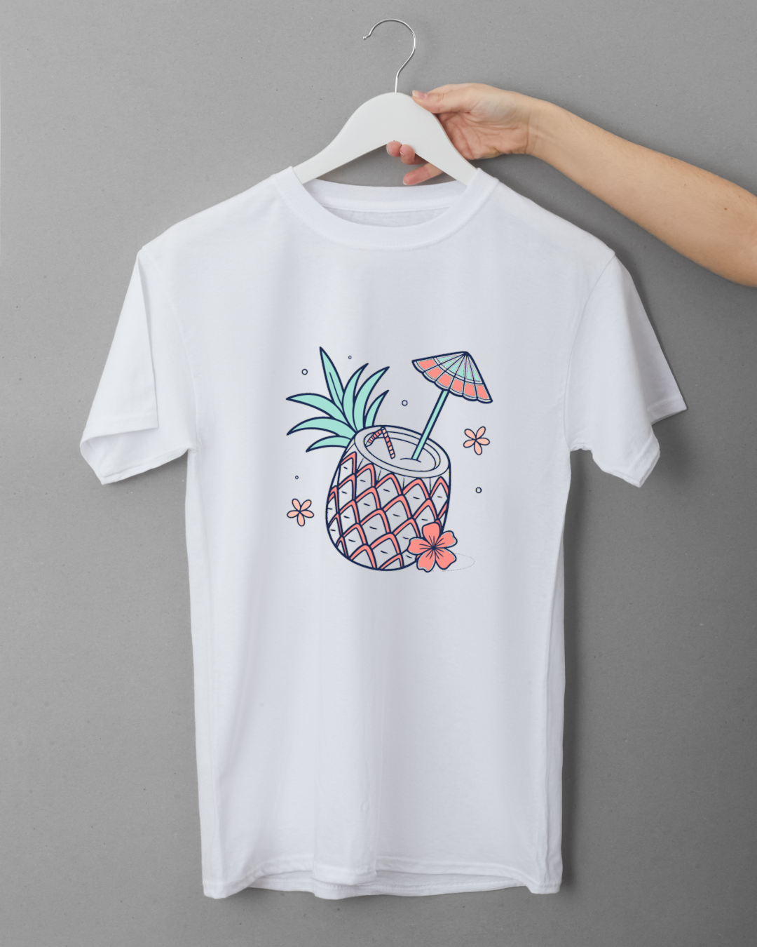 T-shirt avec ananas tropical pastel évoquant l'évasion estivale propice à l'été