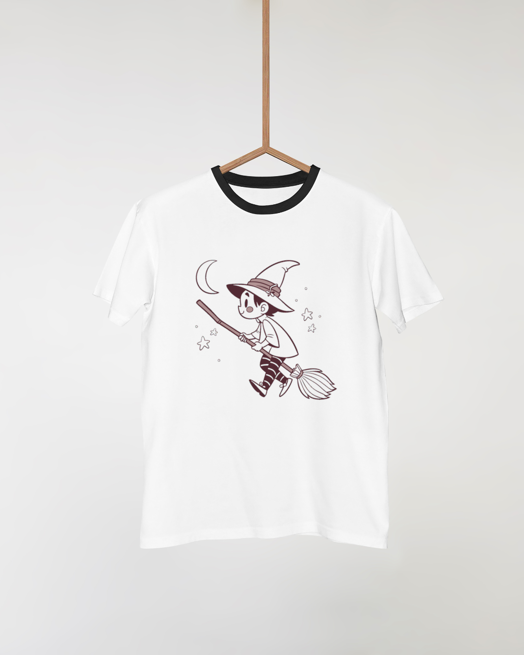 T-shirt avec décor de petit sorcier volant sur fond Halloween éblouissant