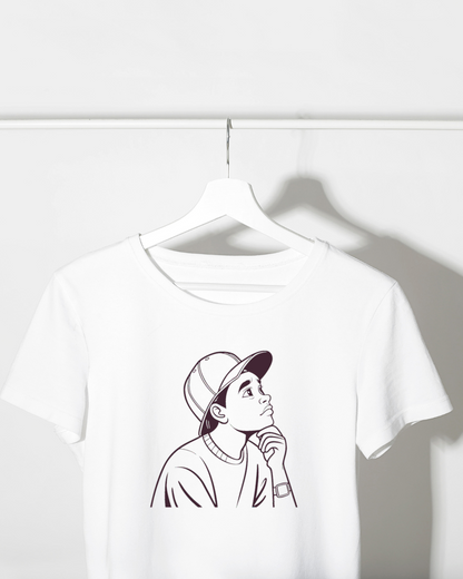 T-shirt créatif avec icône monochrome représentant un jeune rêveur pensif