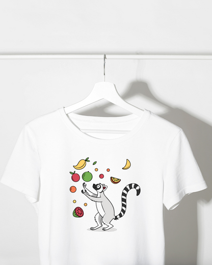 T-shirt avec lémurien minimaliste jonglant des fruits ambiance tropicale