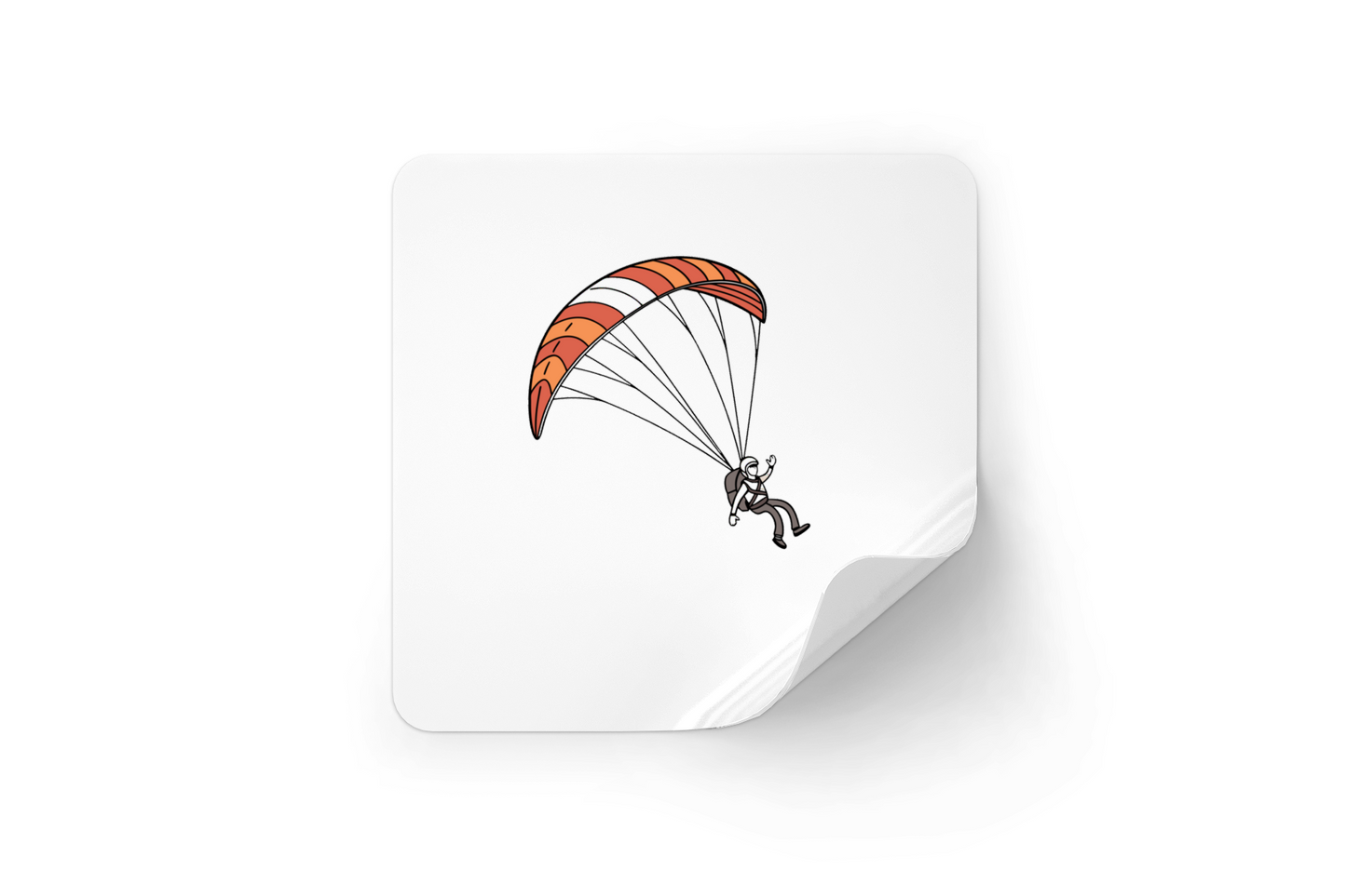 Sticker vibrant avec un parapentiste en plein vol, parfait pour les fans d'aventure