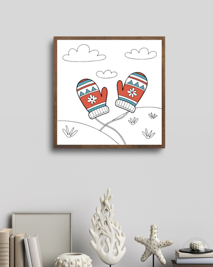 Décor mural cadre avec des moufles stylisées pour une touche cocooning