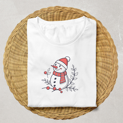 T-shirt festif illustré d'un bonhomme de neige joyeux sur un fond hivernal magique