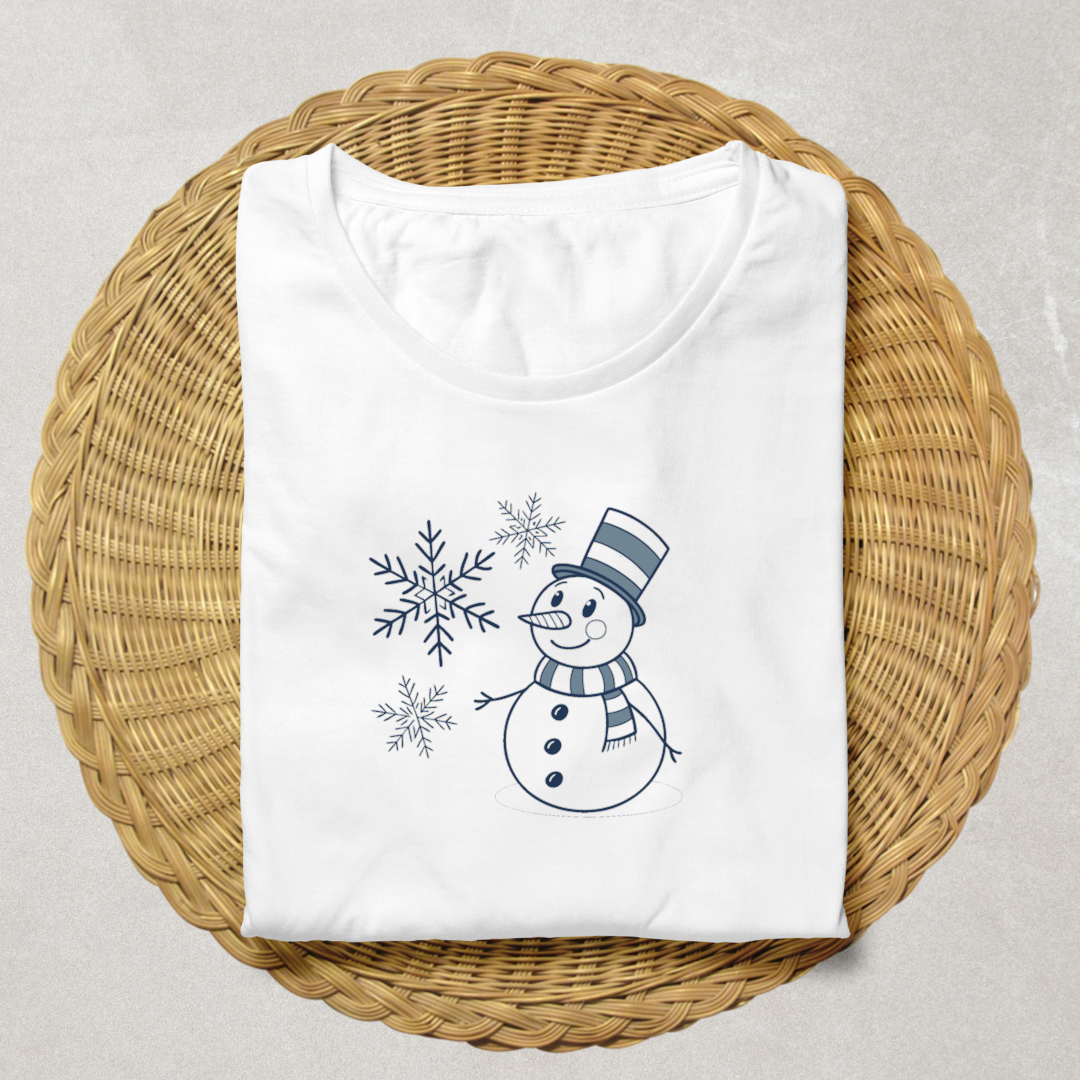 T-shirt hiver magique avec bonhomme de neige minimaliste décorant le centre