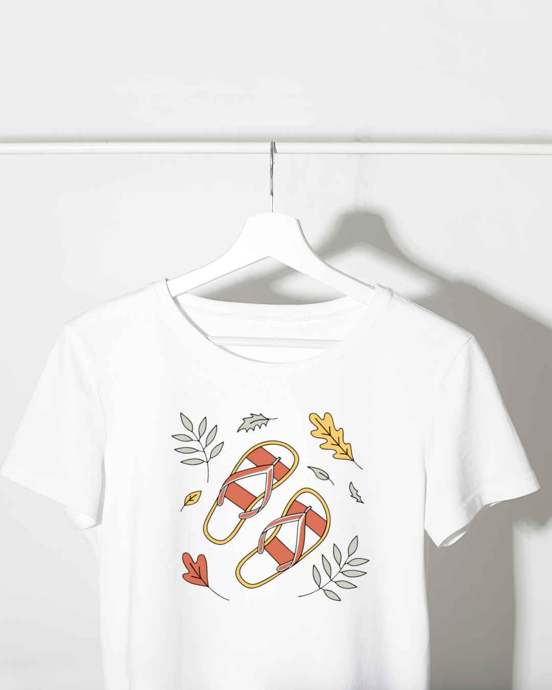 T-shirt avec motif de tongs flottantes automnales sur fond élégant