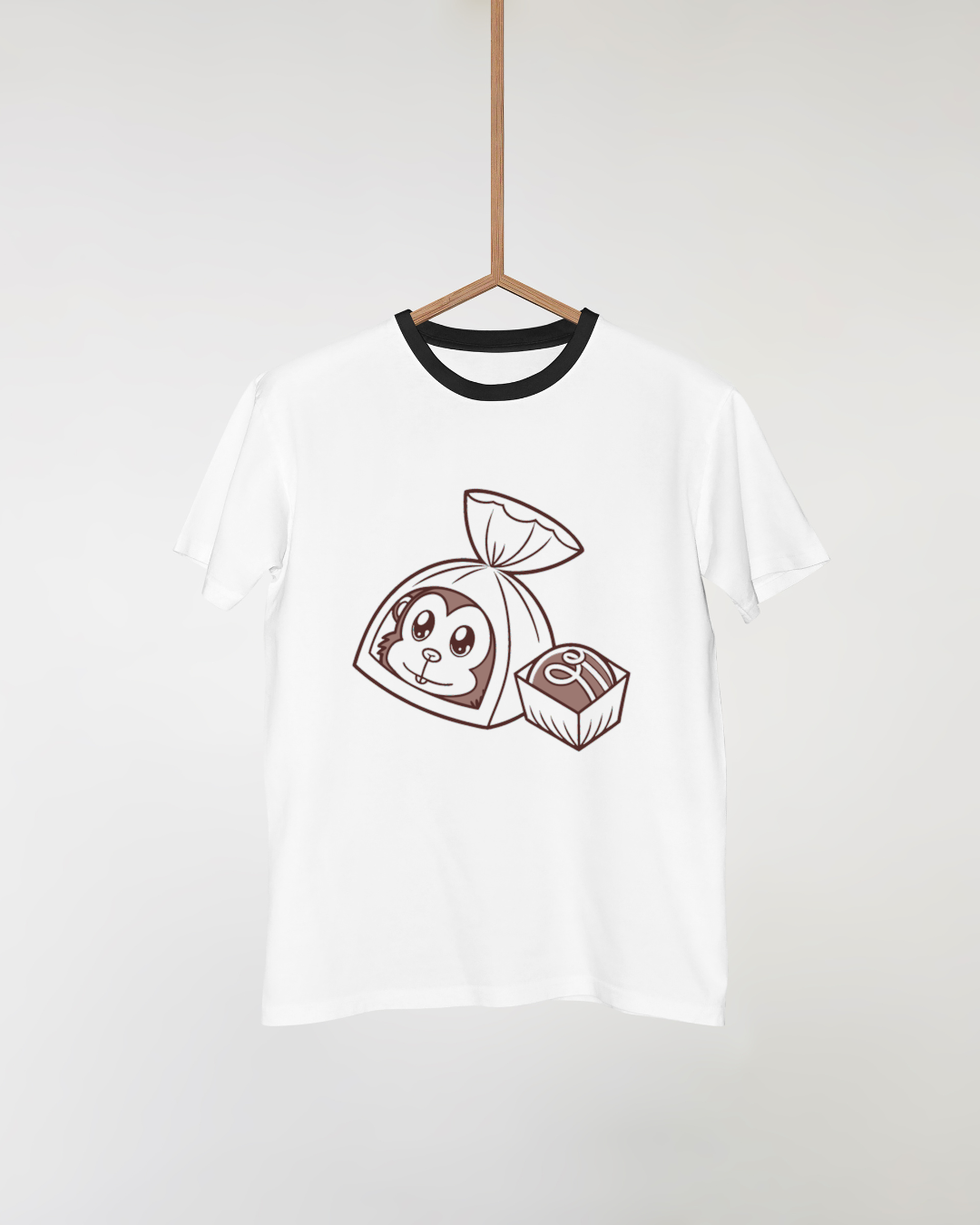 T-shirt avec un motif ludique de singe curieux en bonbonnière colorée