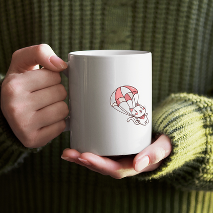 Chat ballon illustré sur mug, donnez vie à vos accessoires quotidiens.