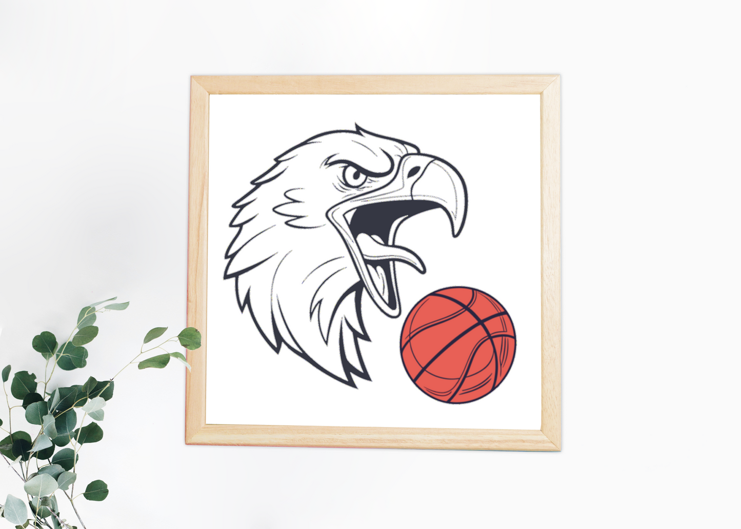 Cadre sportif avec aigle dynamique tenant un ballon de basket