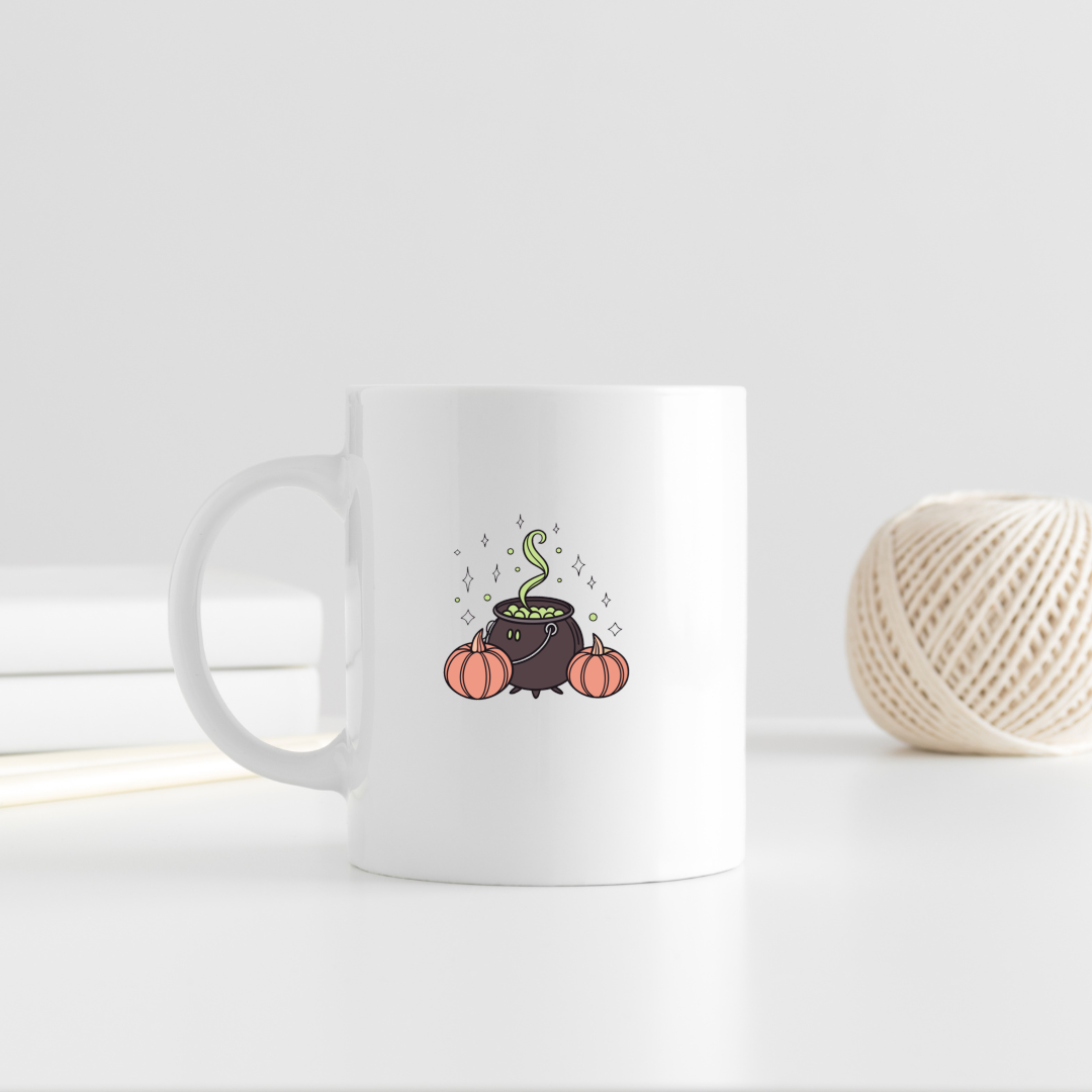 Mug avec un chaudron mystique fumant pour une ambiance Halloween envoûtante