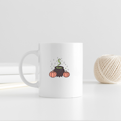 Mug avec un chaudron mystique fumant pour une ambiance Halloween envoûtante
