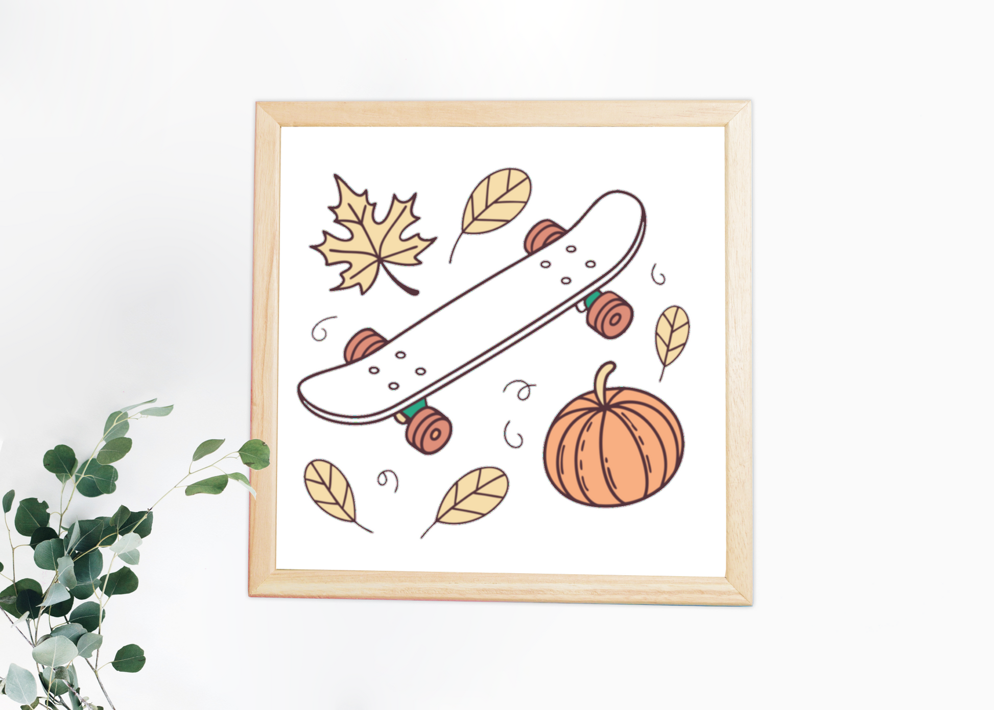 Cadre décoratif avec skateboard pastel et ambiance Halloween automnale