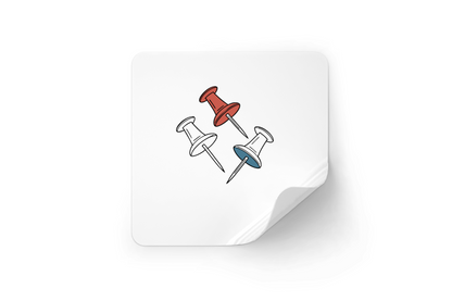 Sticker avec épingles colorées et vives en rotation sur fond de bureau créatif