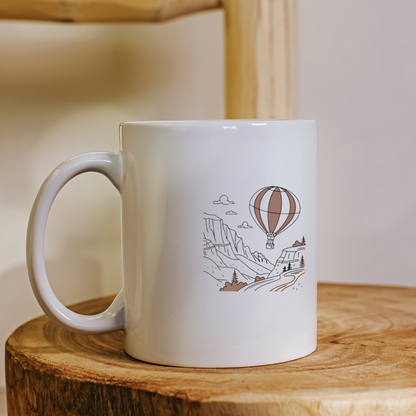 Mug décoré d'une montgolfière pastel symbole d'aventure et connexion avec la nature