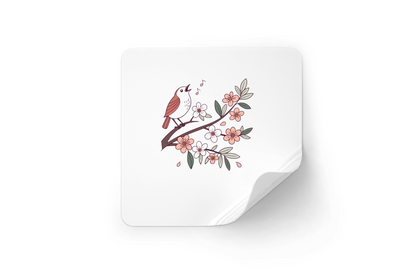 Sticker représentant un oiseau chantant sur une branche avec un motif floral élégant