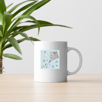 Mug valorisant un cerf-volant fleuri, incarnant une douceur printanière élégante