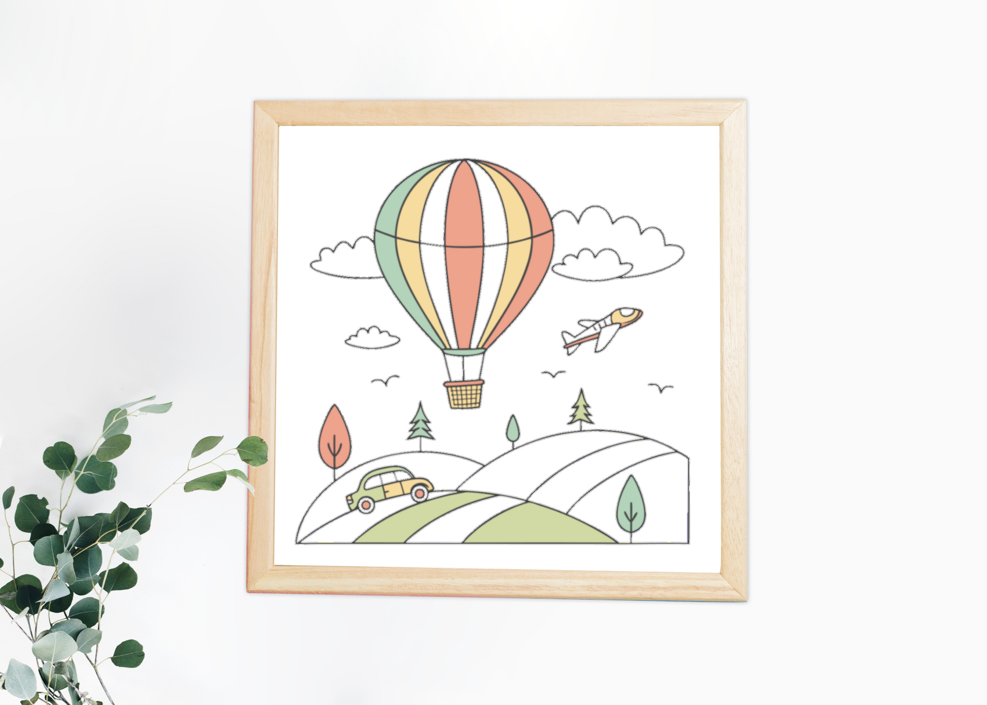 Cadre décoratif avec montgolfière sur fond pastel pour une ambiance aérienne détendue