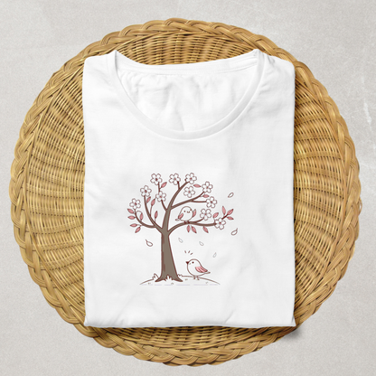 T-shirt avec motif pastel d'oiseaux sous cerisier fleuri ambiance estivale