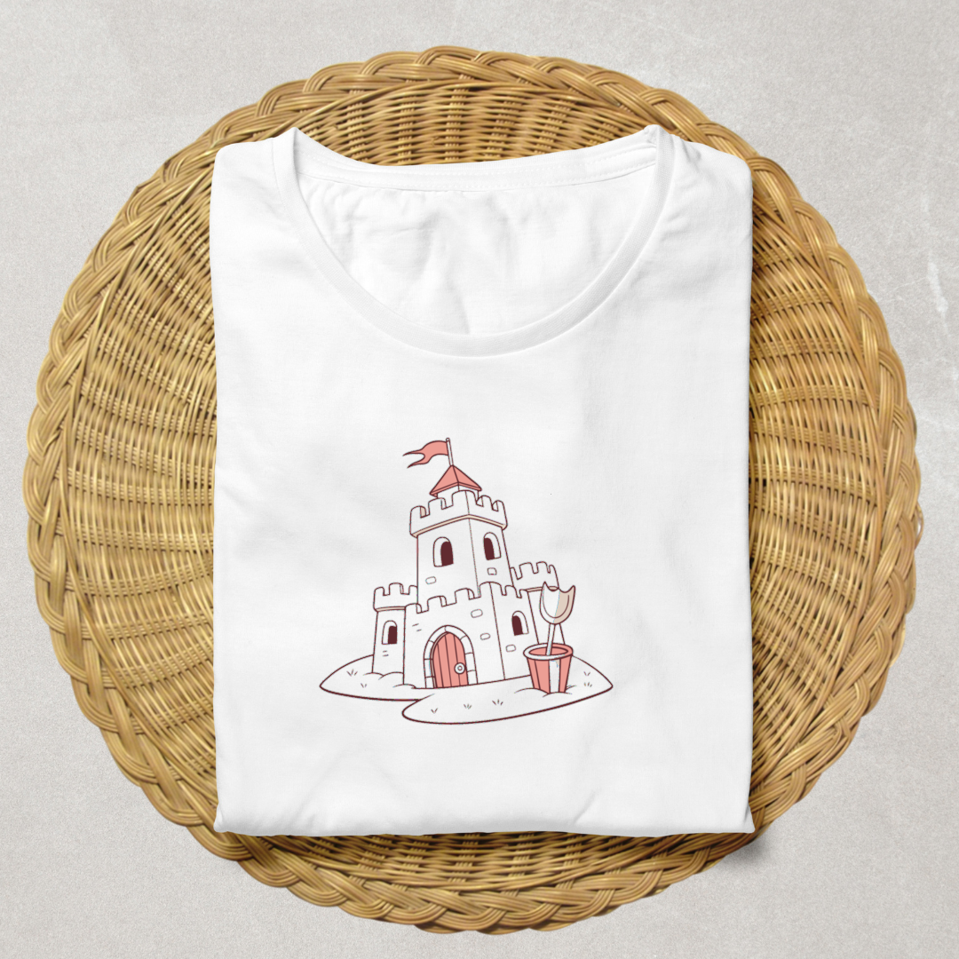 T-shirt summer games décoré d’un château de sable et pelle dans des tons pastel