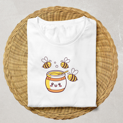 T-shirt avec des abeilles joyeuses dans un style kawaii autour d'un pot de miel