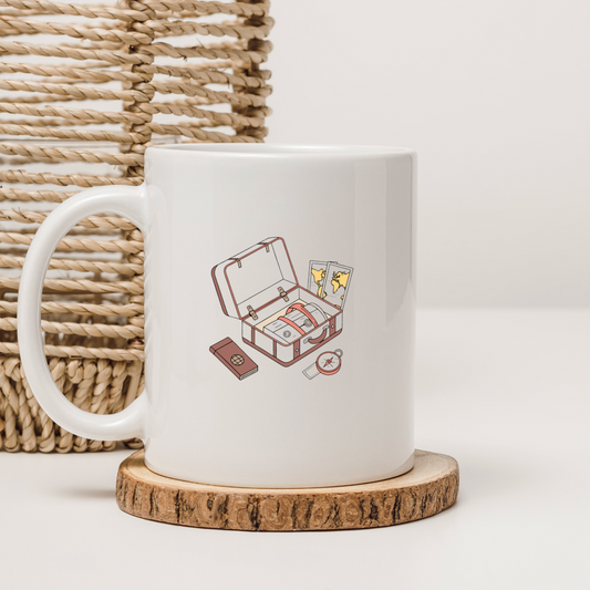 Mug avec design plat d'une valise de voyage pour explorer le monde