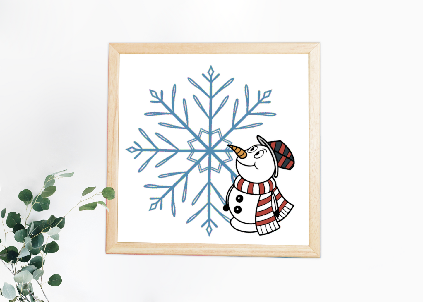 Cadre avec un bonhomme de neige joyeux pour une touche hivernale décorative