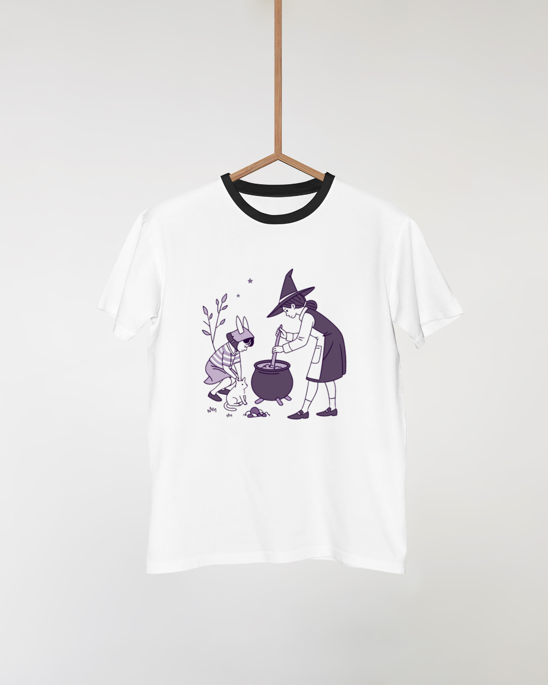 T-shirt avec enfant sorcière magique en vectoriel pour Halloween enchanté