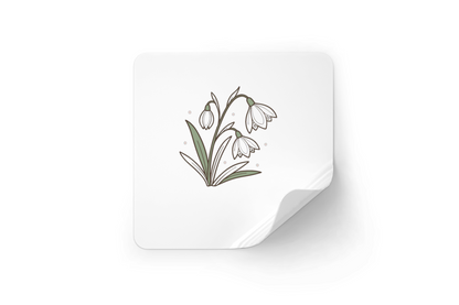 Sticker rond orné d'une icône de perce-neige délicate dans des tons pastel doux
