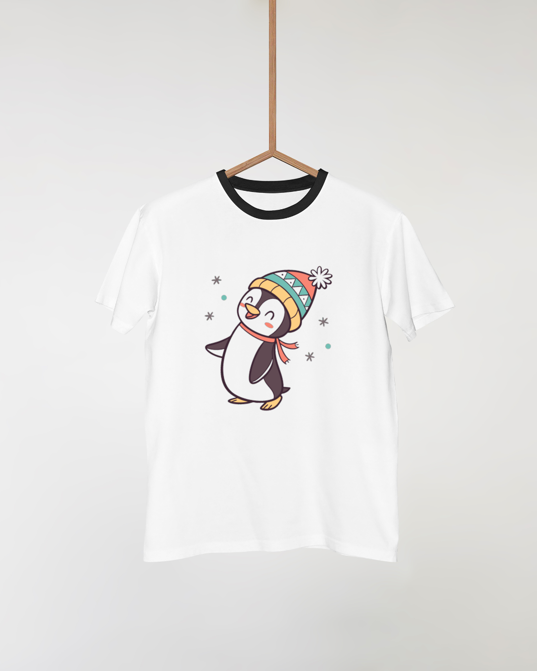 T-shirt avec un pingouin festif style kawaii pour un look hivernal original