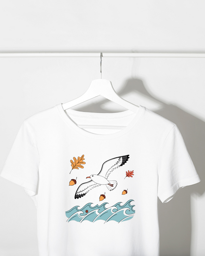 T-shirt automnal avec mouette élégante sur vague dans un style attractif et moderne