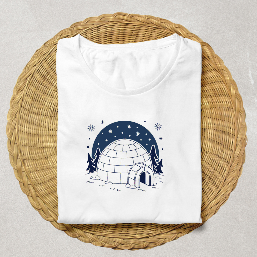 T-shirt avec décor hivernal d'un igloo enneigé sous un ciel étoilé magique