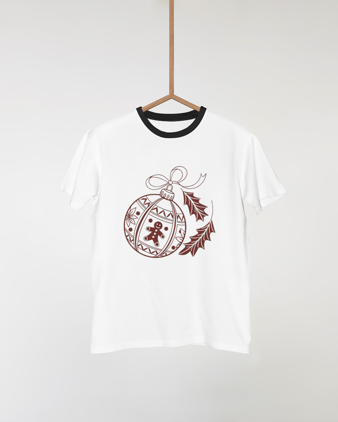 T-shirt chic avec dessin festif d'une boule de Noël dans un style vectoriel