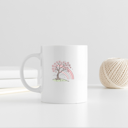 Mug décoré d'une icône pastel de cerisier en fleurs et arc-en-ciel ambiance joyeuse