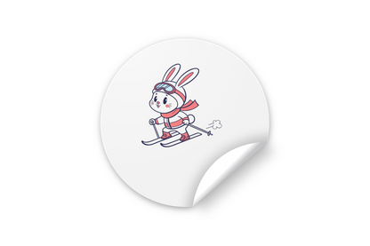 Sticker vibrant représentant un lapin skier joyeux dans un style cartoon hivernal