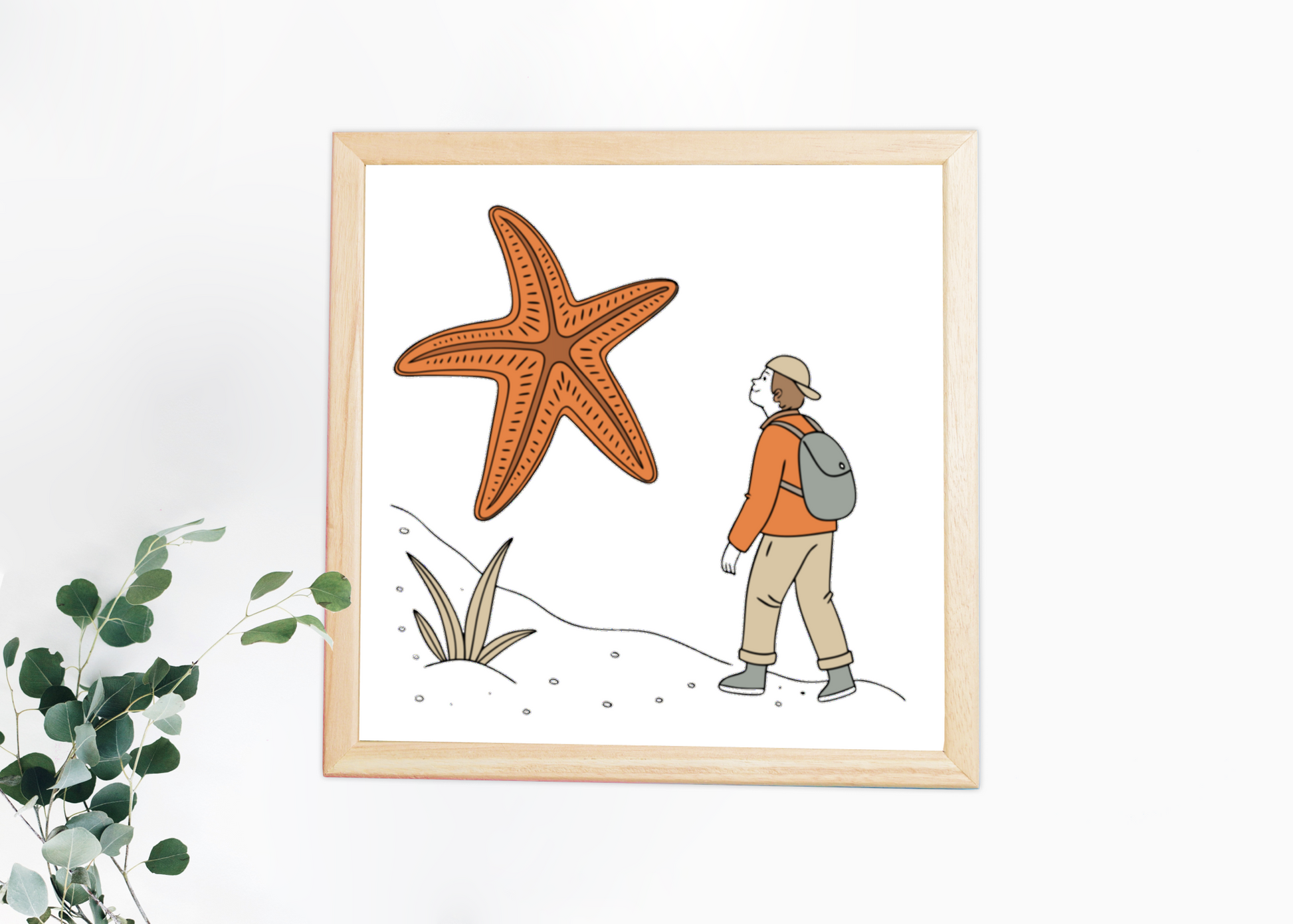 Cadre en bois avec dessin aventure et étoile de mer géante en illustration centrale