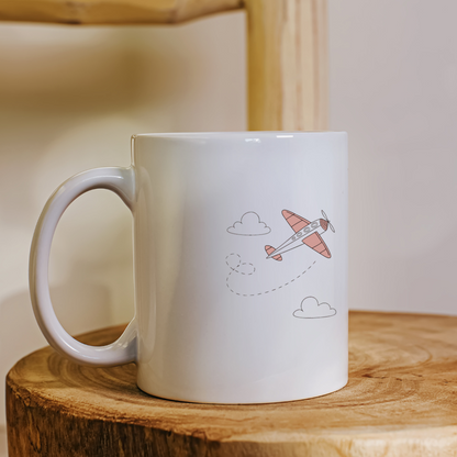 Mug élégant avec motif d'avion rétro en vol pastel pour une aventure aérienne
